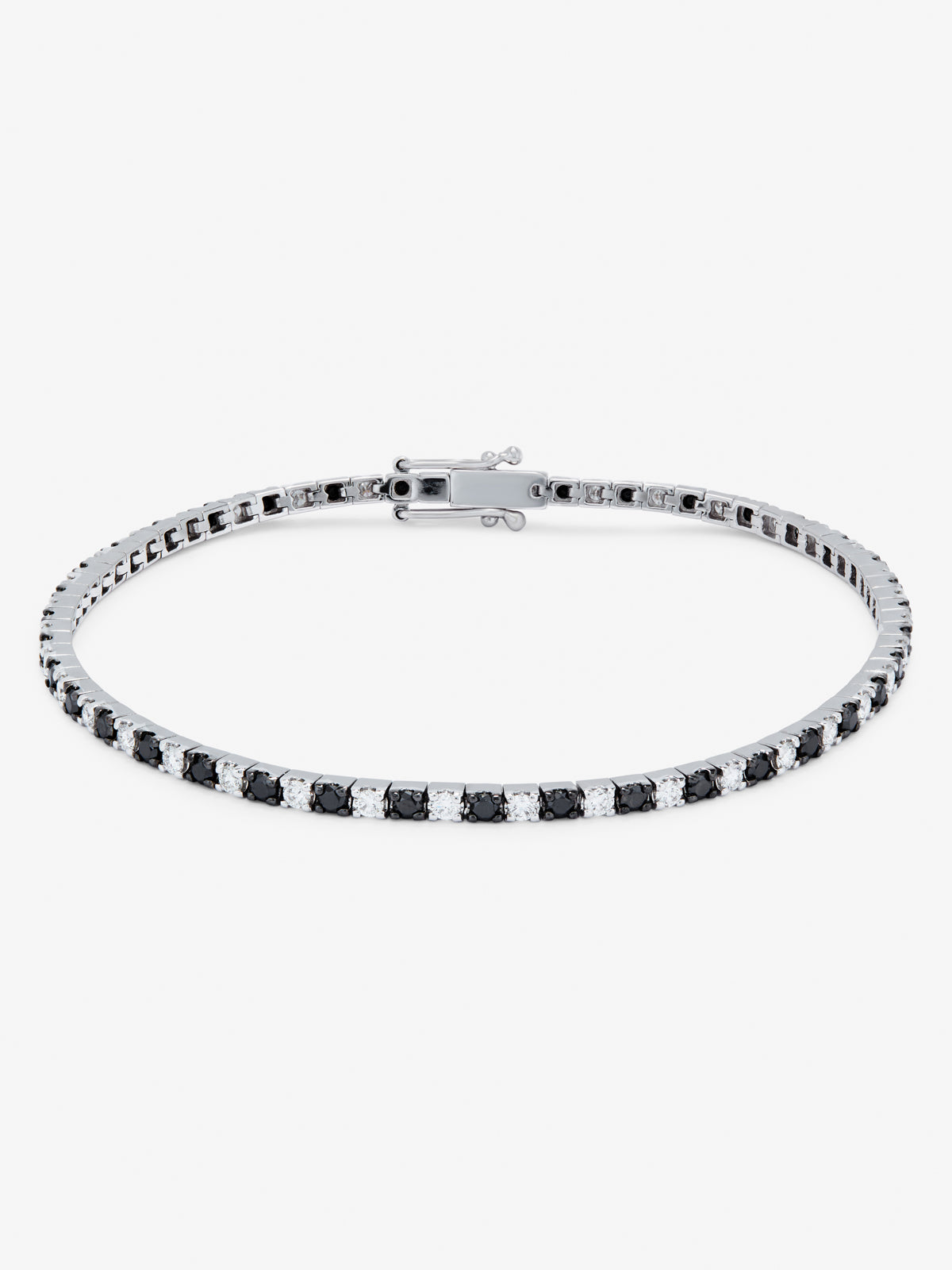 Pulsera riviere de oro blanco de 18K con diamante negro y diamante blanco