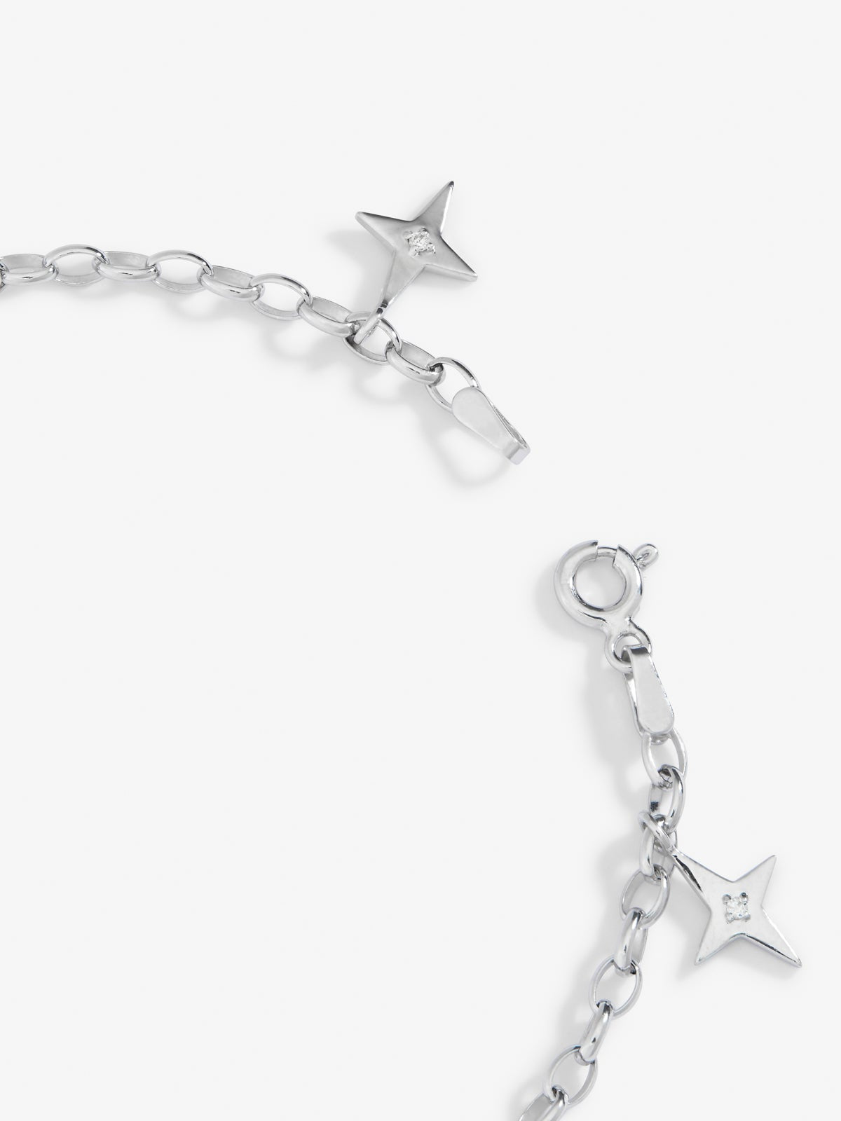 Pulsera de plata 925 con 7 diamantes en talla brillante con un total de 0,05 cts y estrellas
