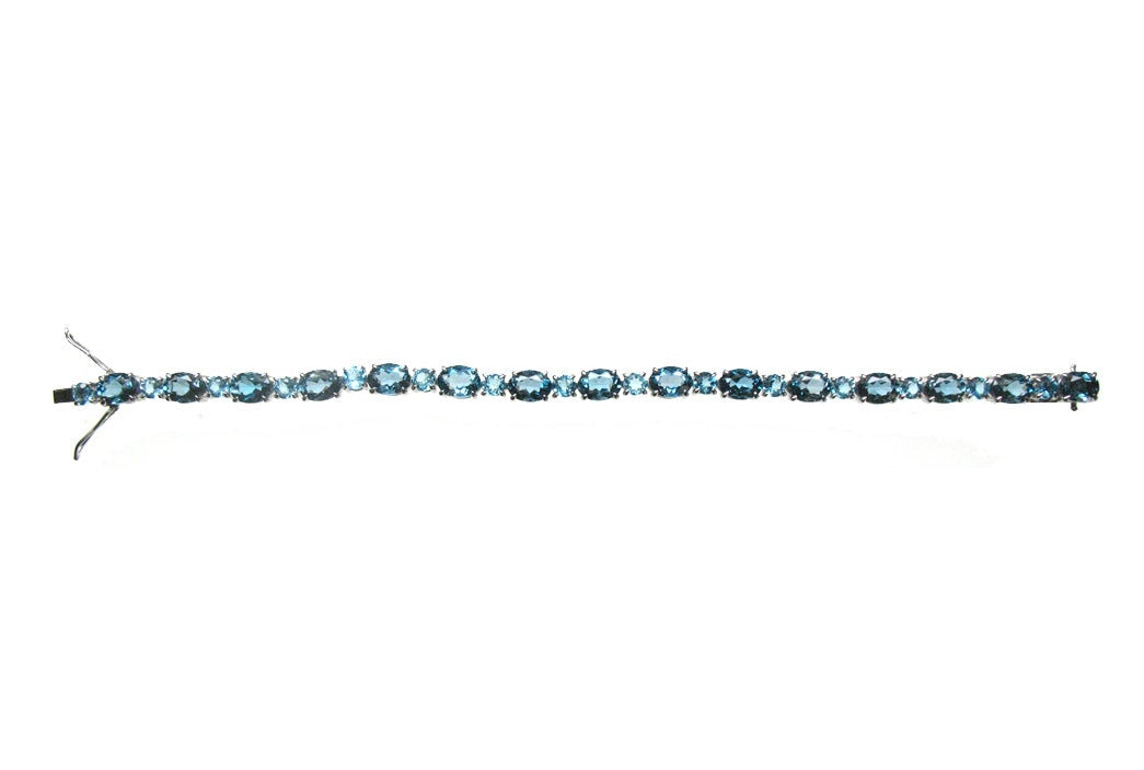 Pulsera rivière de plata 925 con topacios azul london y azul swiss