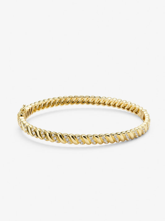 Pulsera rígida de oro amarillo de 18K con diamantes blancos en talla brillante de 0,58 cts