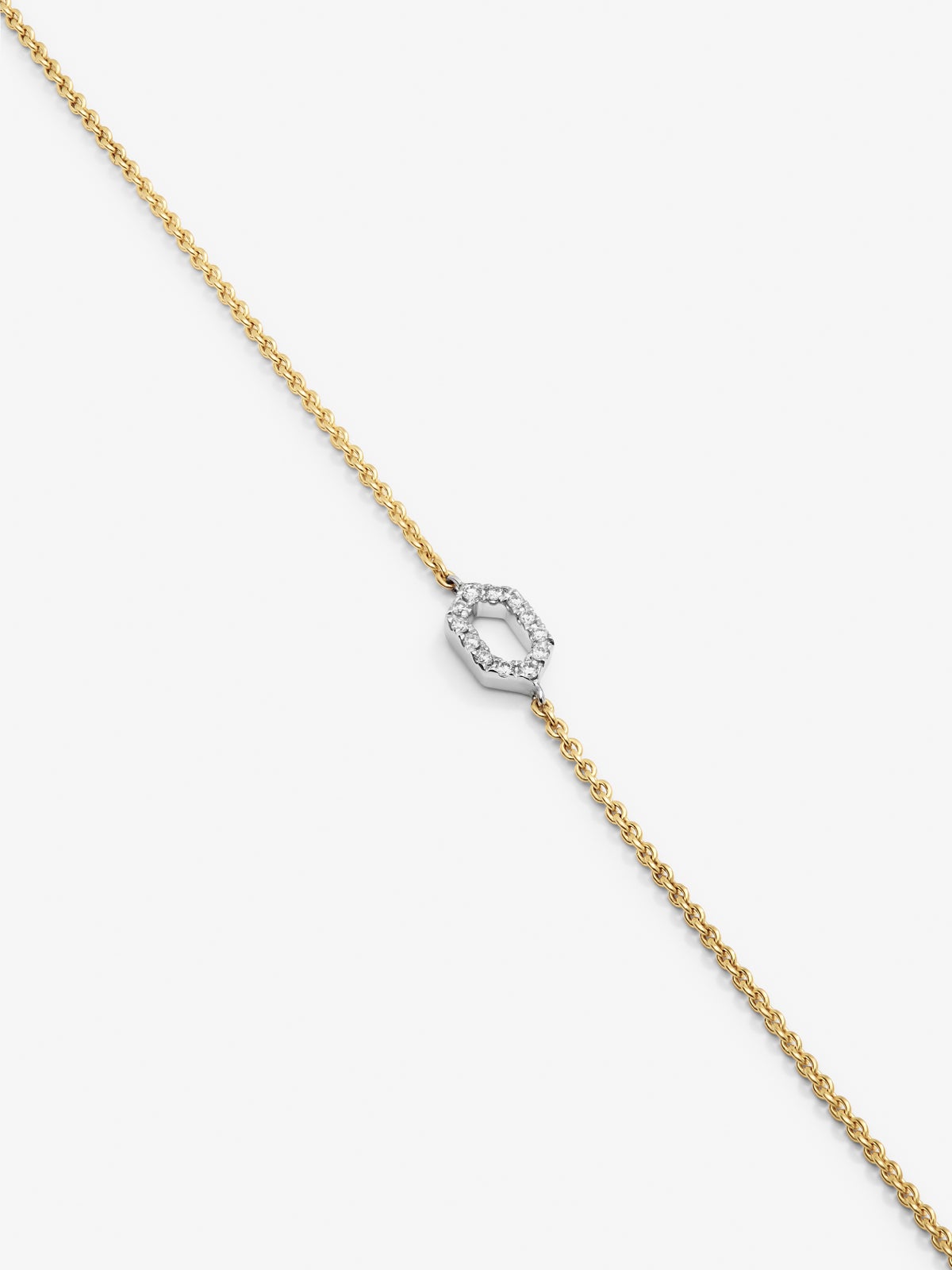 Pulsera de oro blanco y amarillo de 18K con diamantes blancos en talla brillante de 0,03 cts