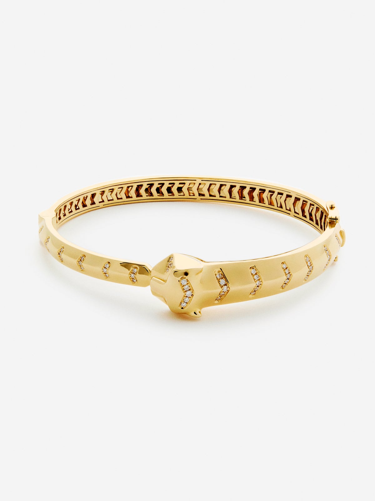 Pulsera rígida de oro amarillo de 18K con 61 diamantes en talla brillante con un total de 0,23 cts y forma de tigre