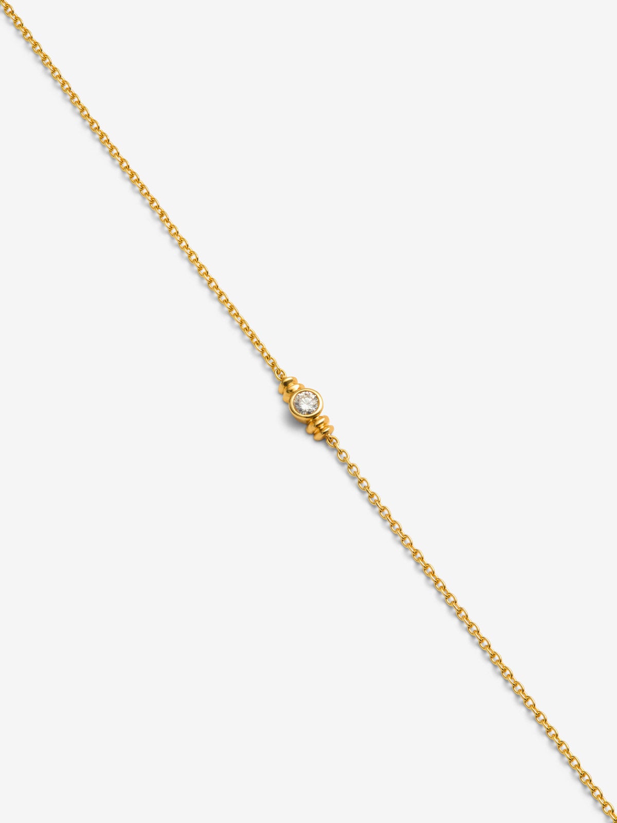 Pulsera de oro amarillo con diamante en talla brillante de 0,07 cts