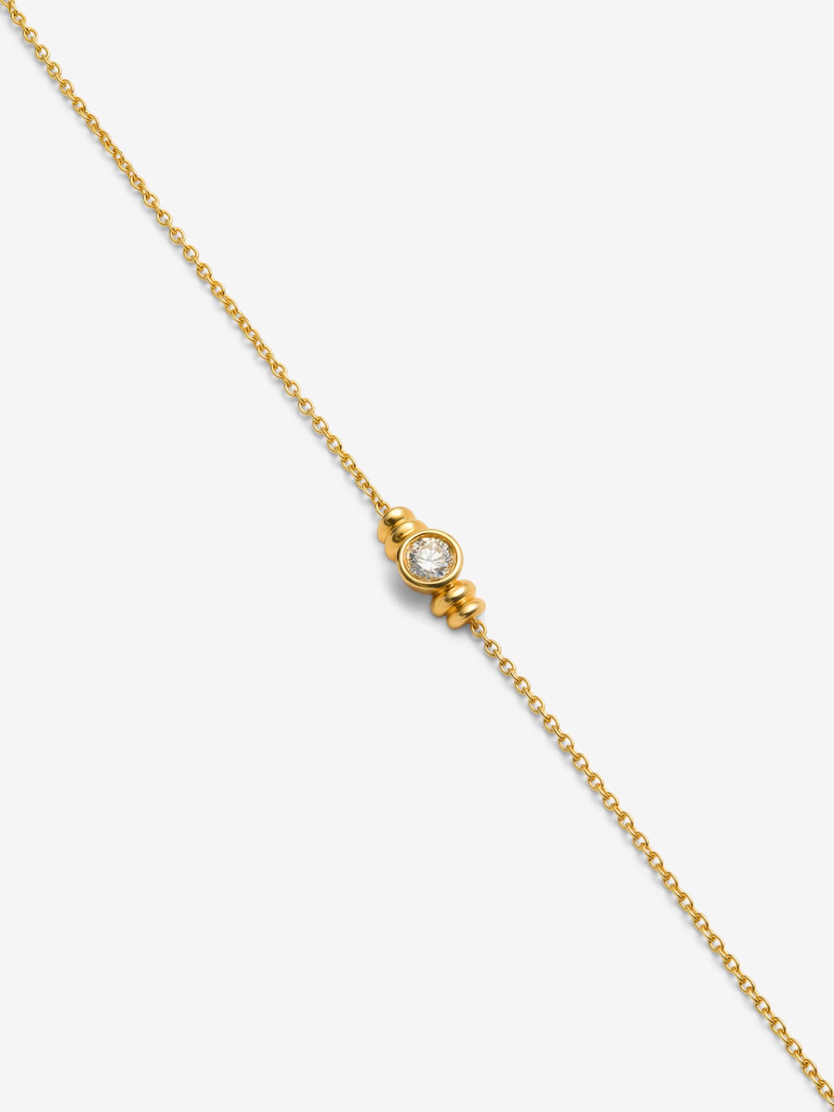 Pulsera de oro amarillo de 18K con diamante en talla brillante de 0,17 cts