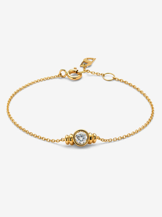 Pulsera de oro amarillo de 18K con diamante en talla brillante de 0,25 cts