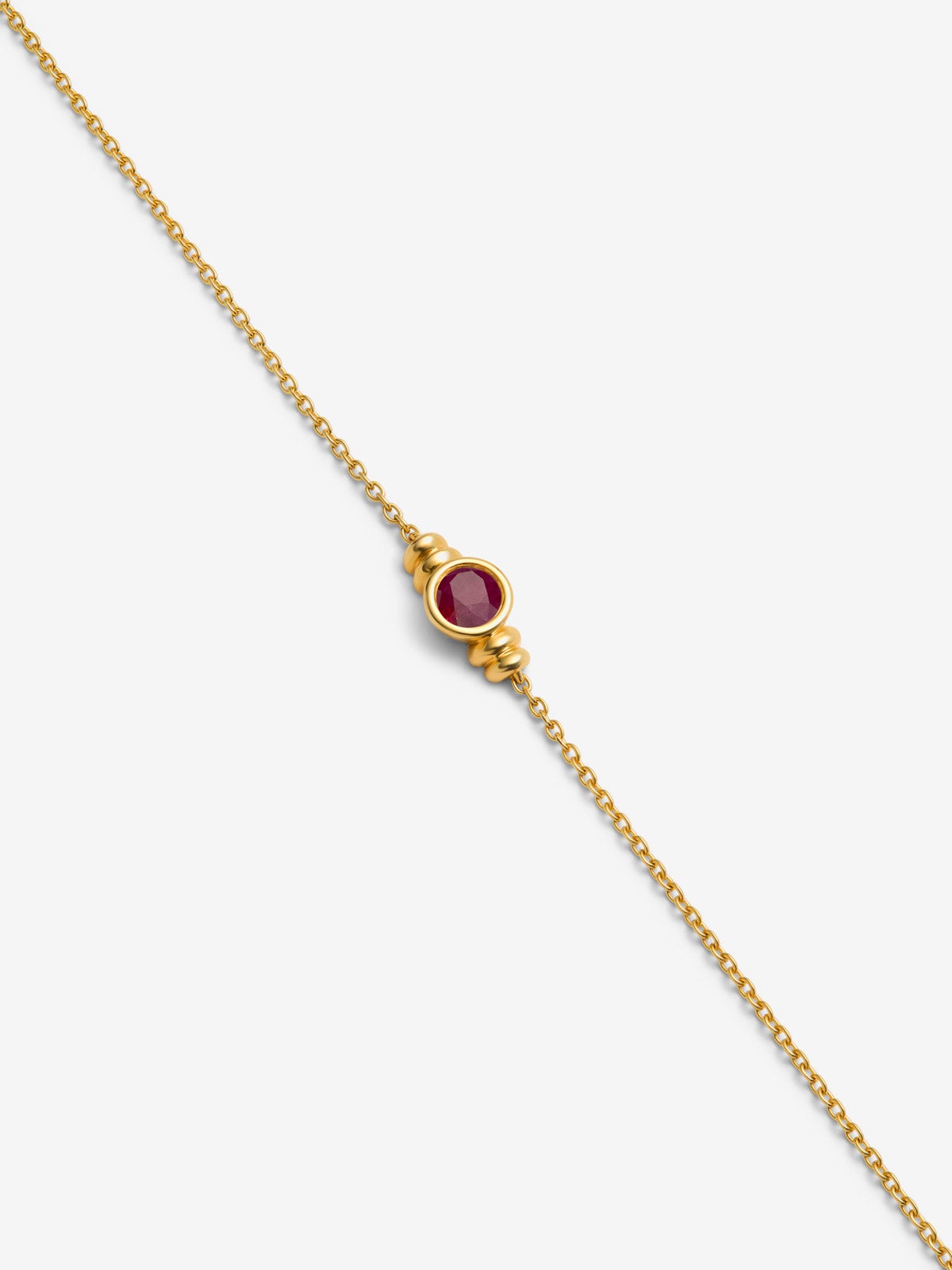 Pulsera de oro amarillo de 18K con rubí en talla brillante de 0,1 cts