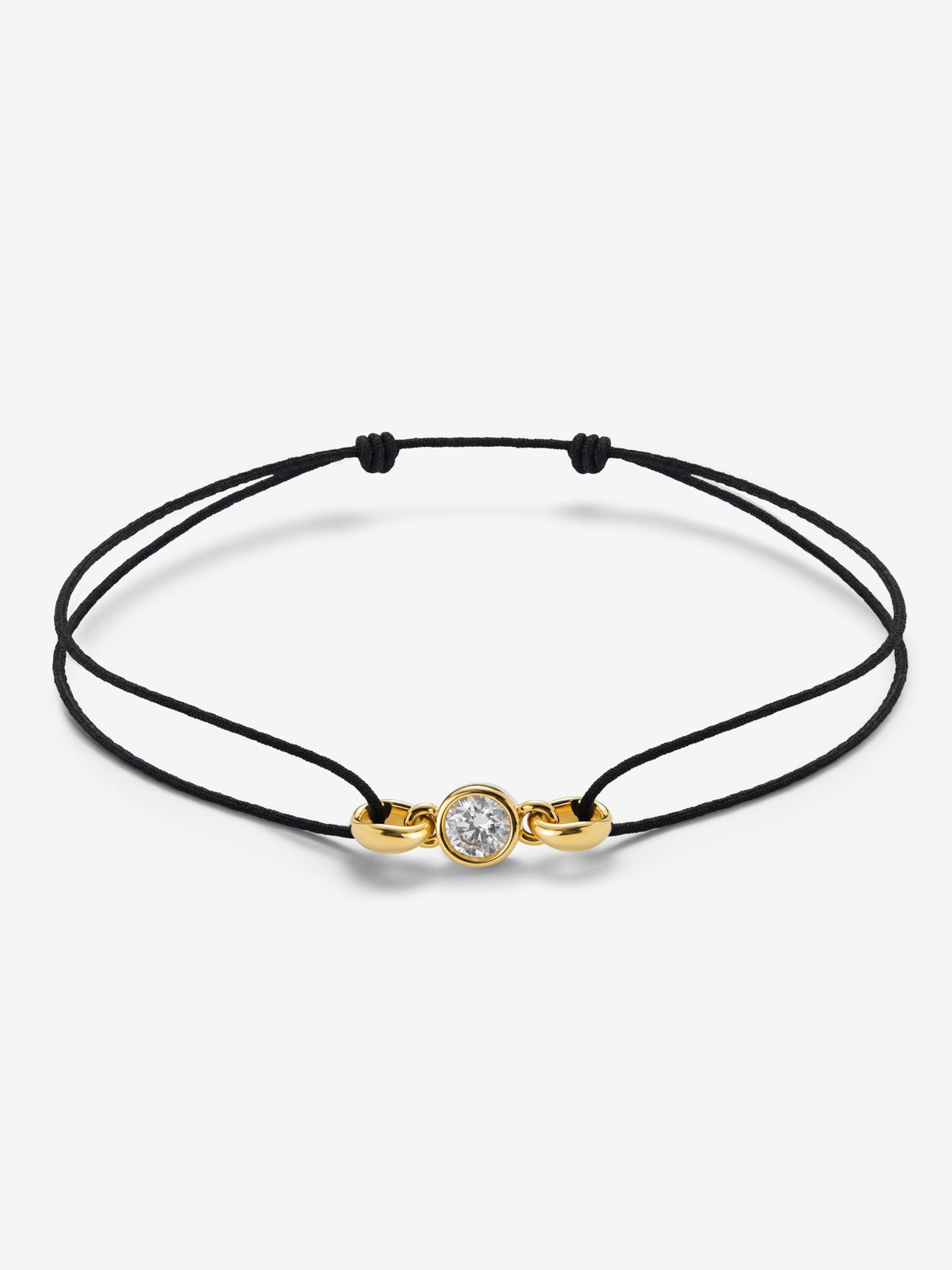 Charm de oro amarillo de 18K con diamante en talla brillante de 0,4 cts