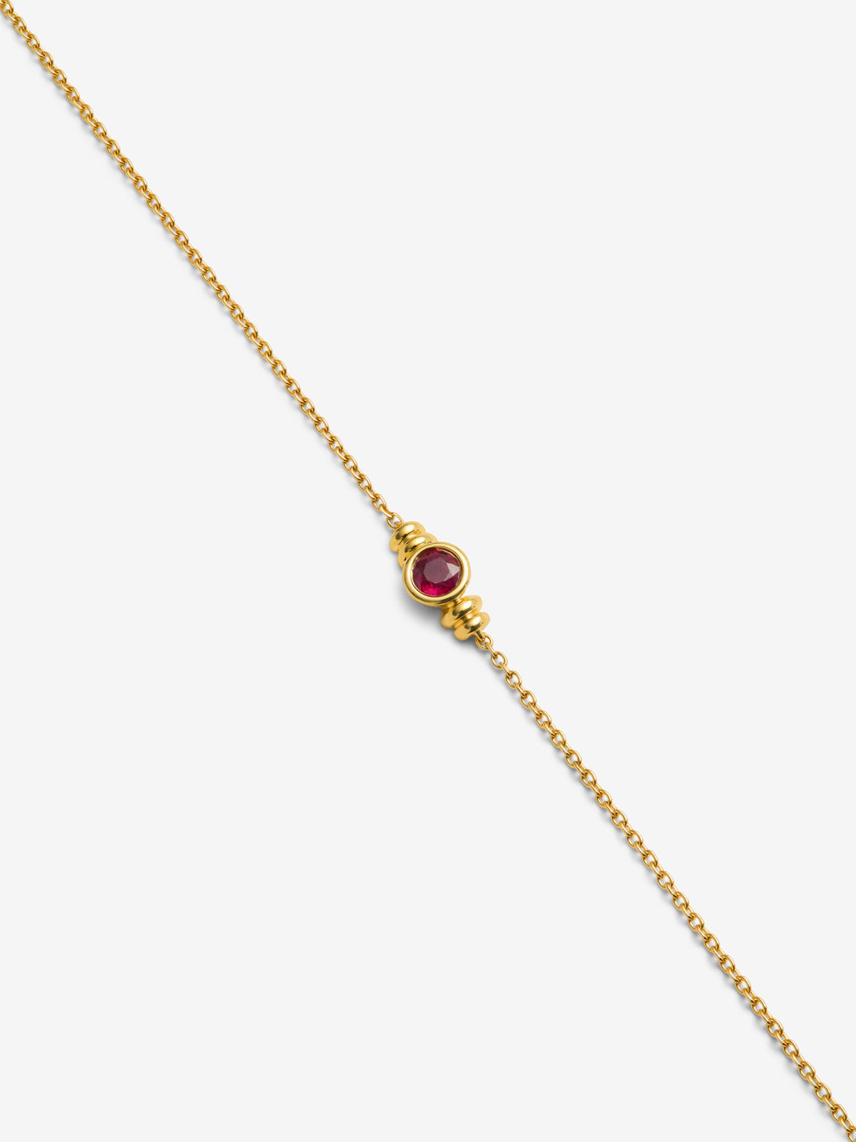 Pulsera de oro amarillo de 18K con rubí rojo en talla brillante de 0,15 cts 
