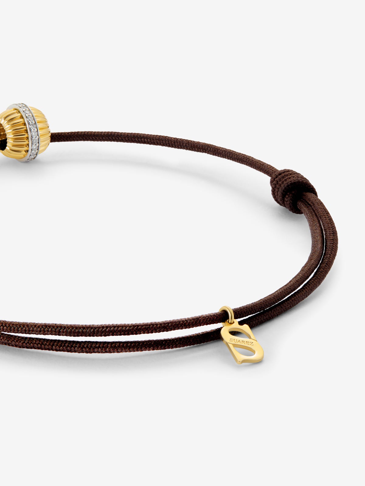 Pulsera gallonada de oro blanco y amarillo de 18K con pavé de diamantes en talla brillante con un total de 0,11 cts
