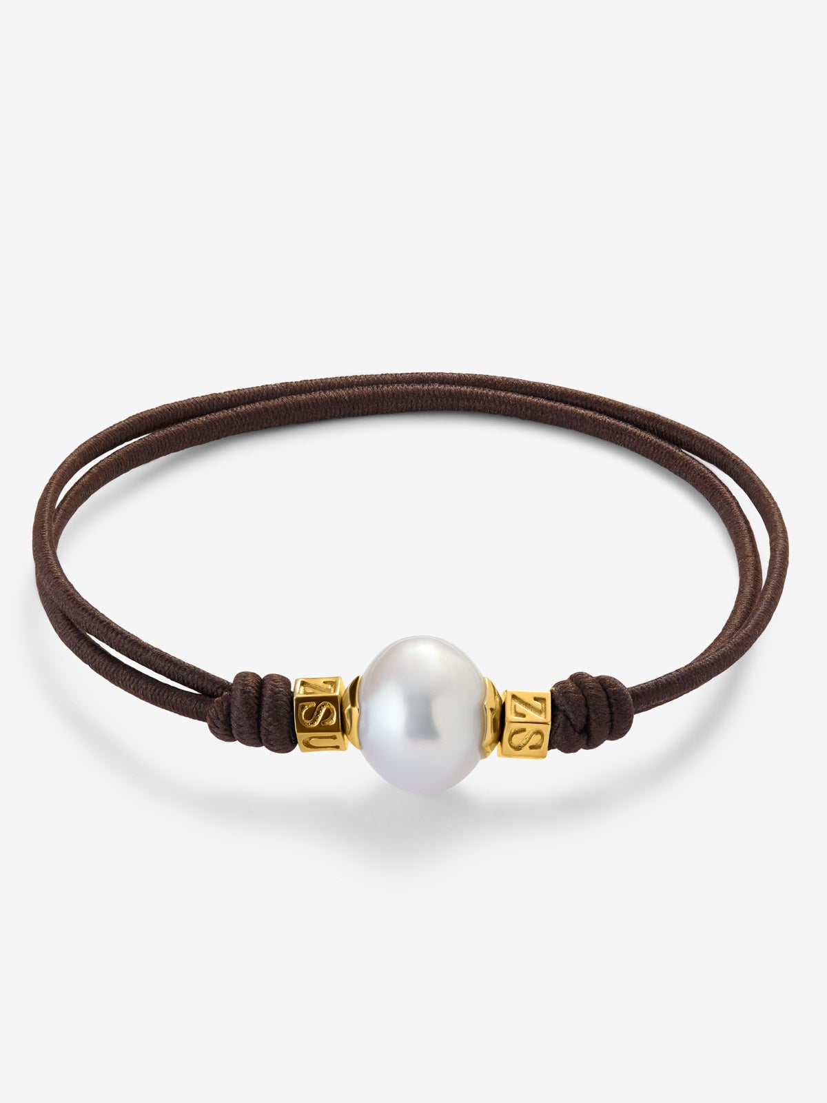 Pulsera one con perla australiana y detalles de oro amarillo de 18K