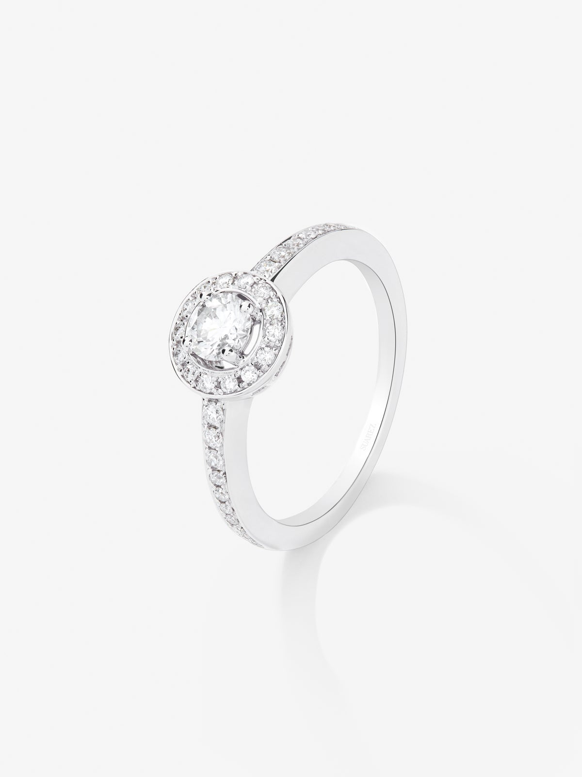 Anillo solitario de compromiso de oro blanco de 18kt con diamante central de 0,40cts