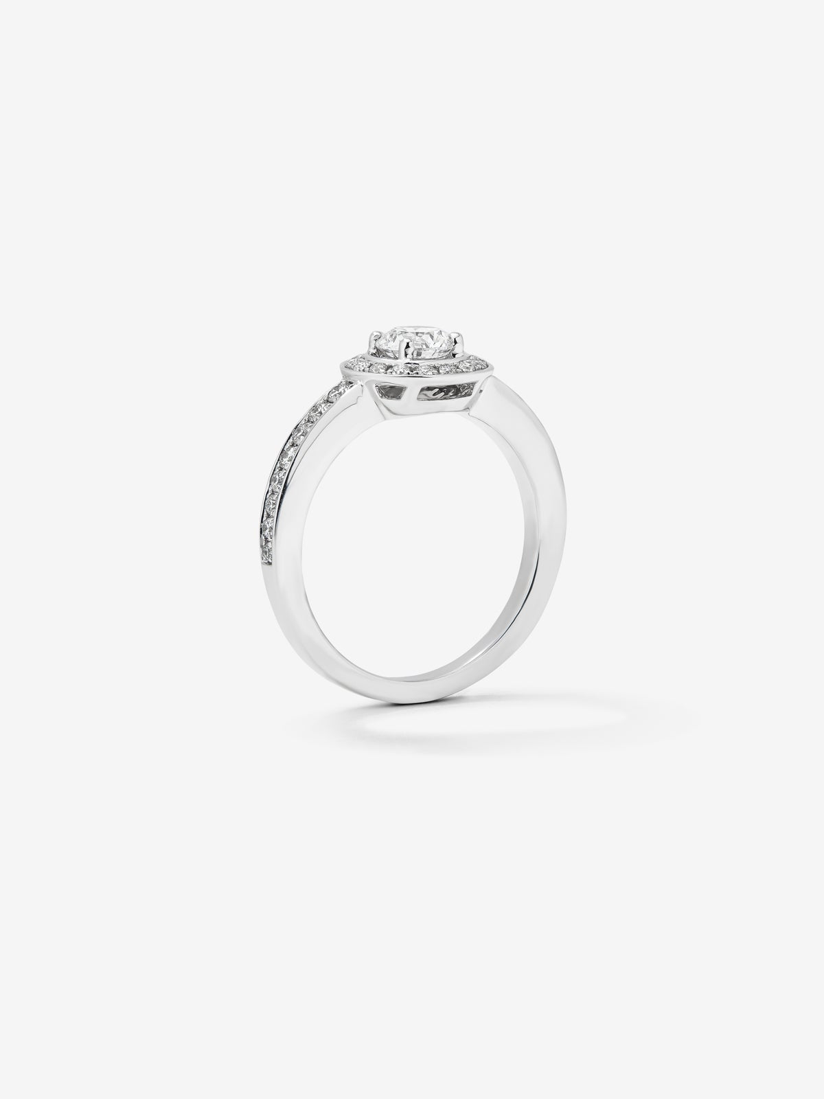 Anillo solitario de compromiso de oro blanco de 18kt con diamante central de 0,40cts
