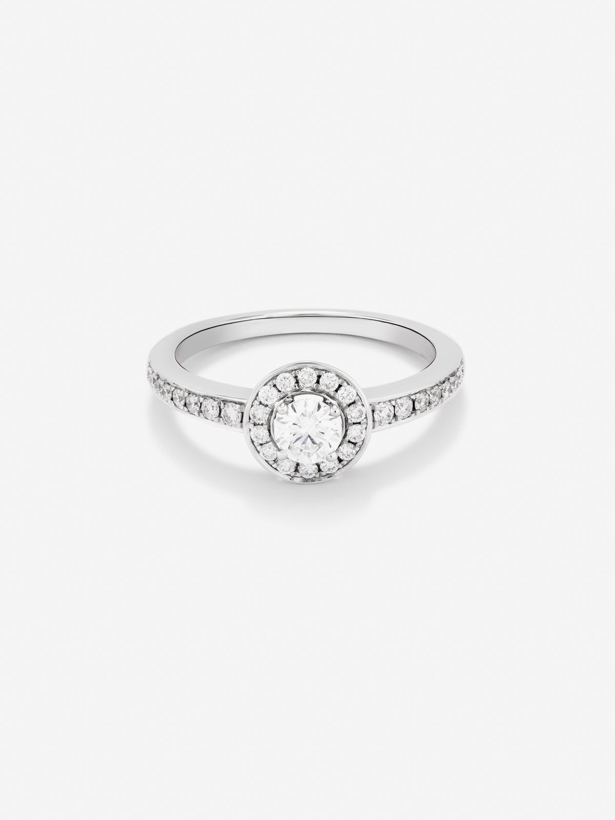18K white gold solitaire ring with central brilliant-cut diamond of 0.25 cts and 30 brilliant-cut diamonds with a total of 0.24 cts