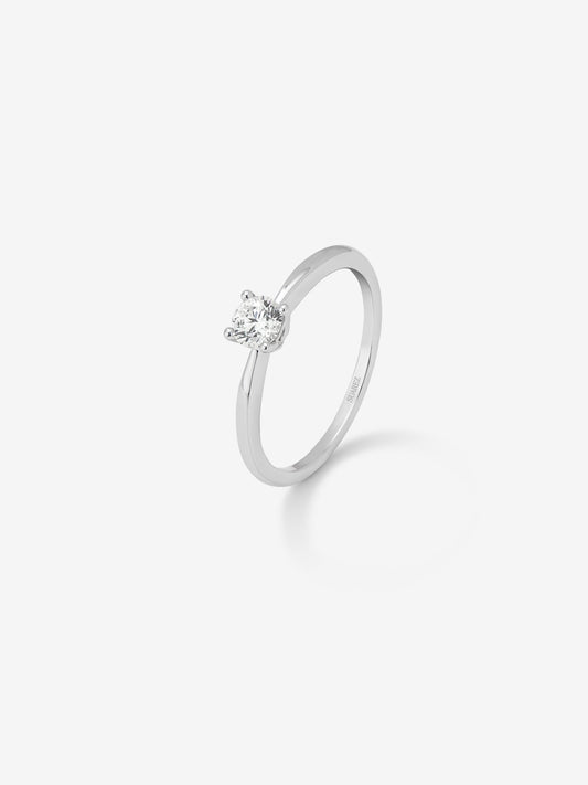 Anillo solitario de oro blanco de 18K con diamante en talla brillante de 025 cts