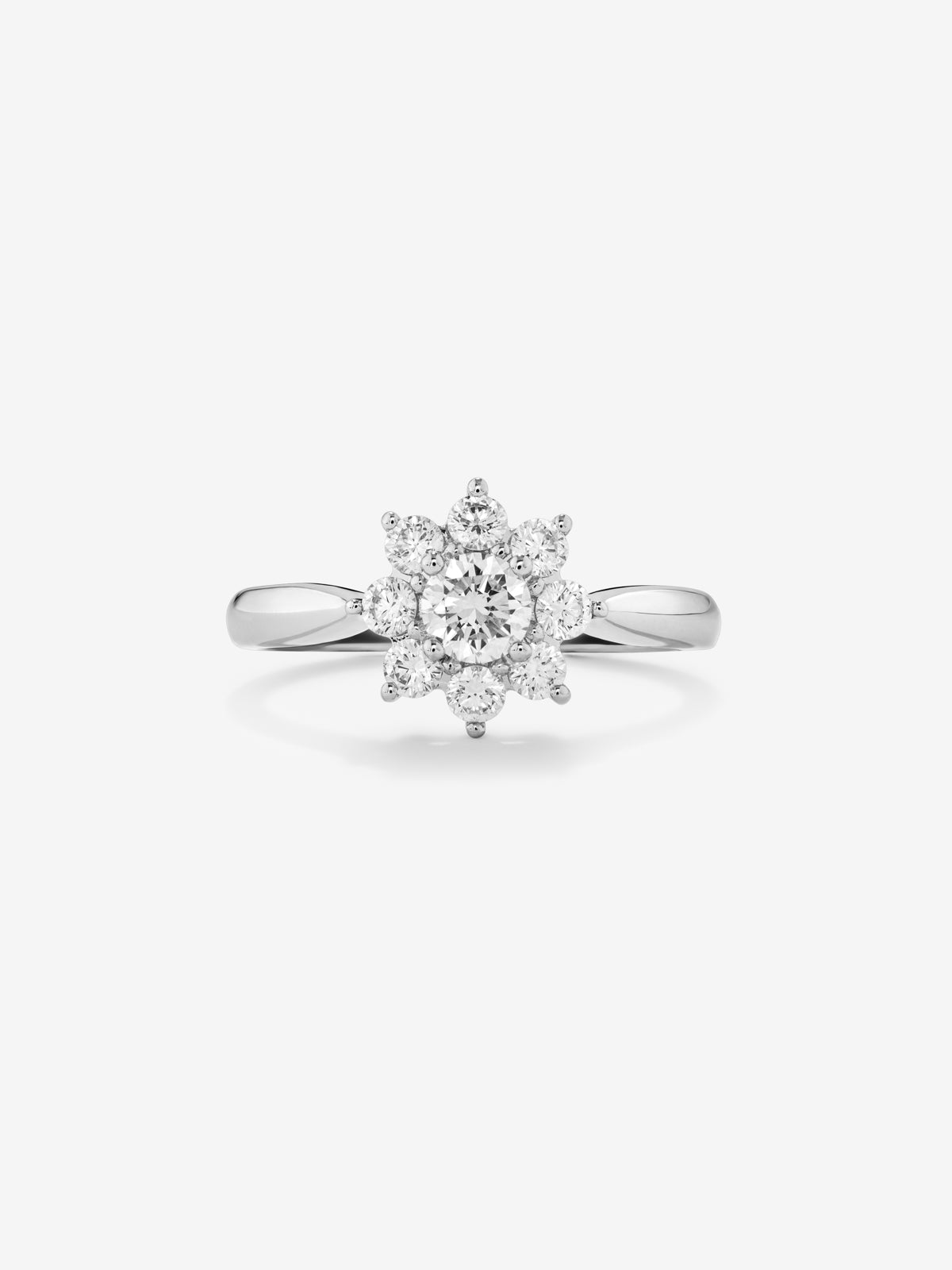Anillo de oro blanco de 18K con 9 diamantes en talla brillante con un total de 0,2 cts con forma de estrella