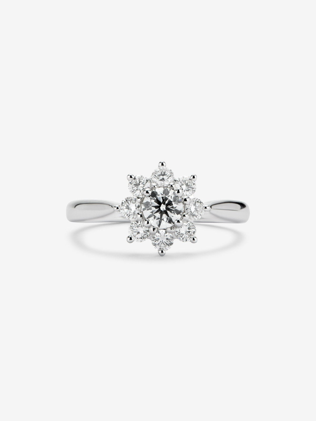 Anillo solitario de compromiso de oro blanco de 18K con diamante central de 0,30 cts