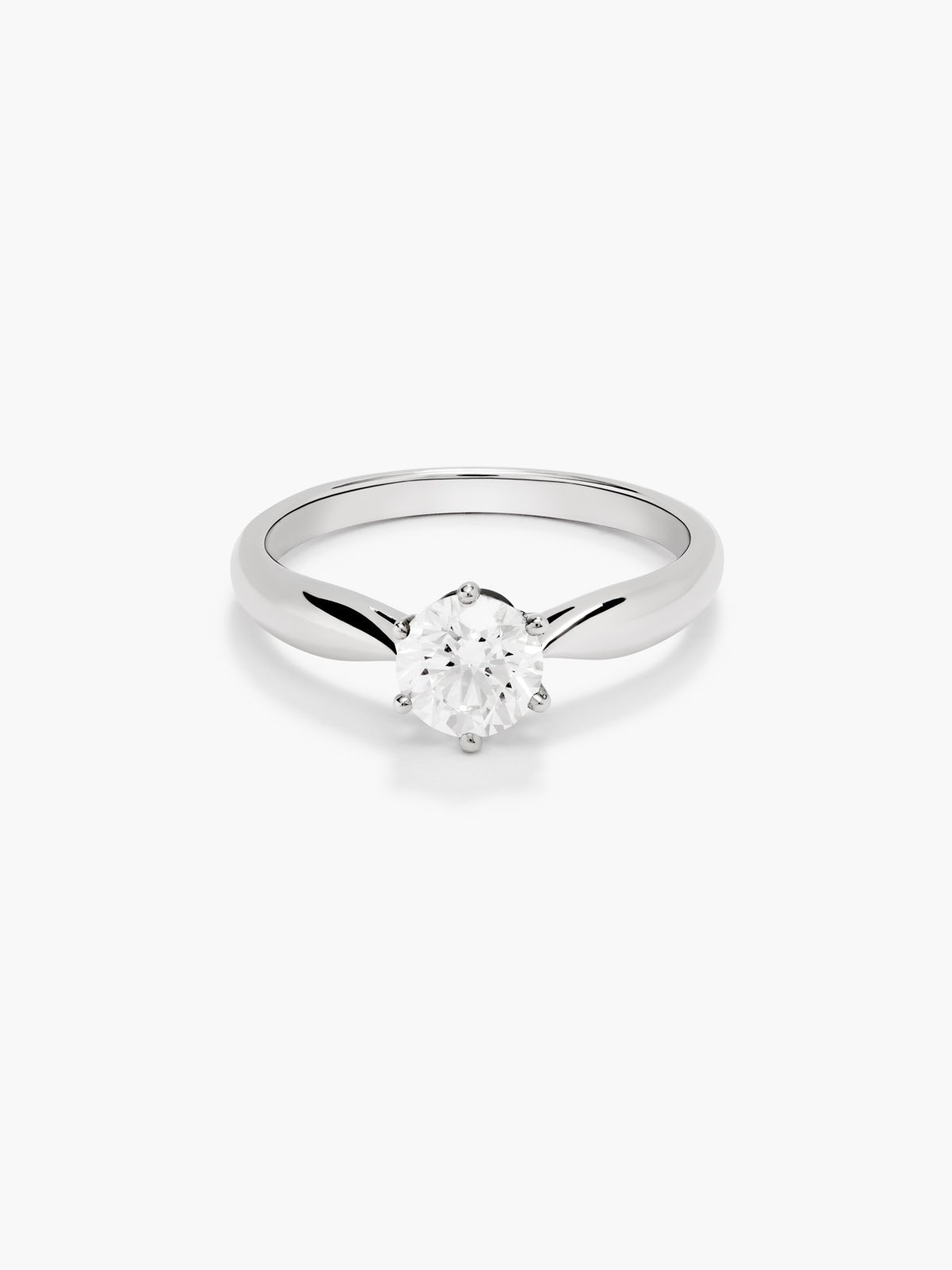 Anillo solitario de oro blanco de 18K con diamante en talla brillante de 0,4 cts