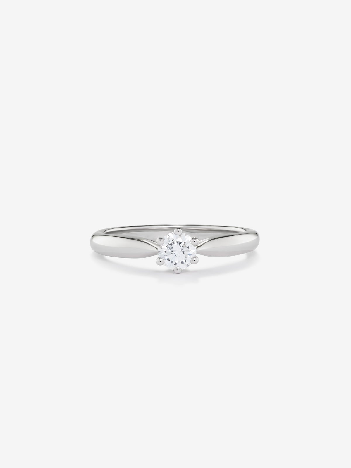 Anillo solitario de oro blanco de 18K con diamante en talla brillante de 0,30 cts