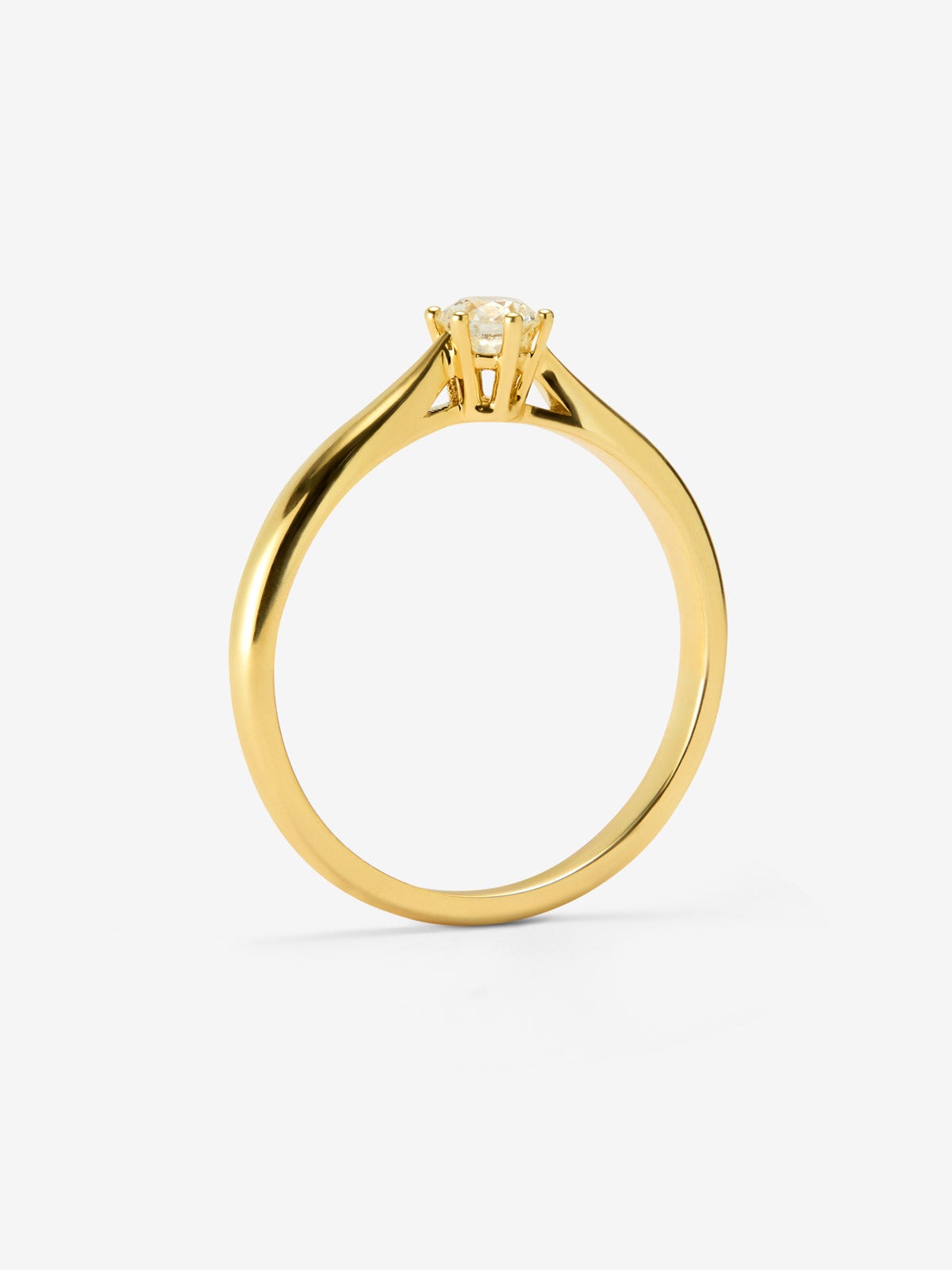 Anillo solitario de oro amarillo de 18K con diamante en talla brillante de 0,2 cts