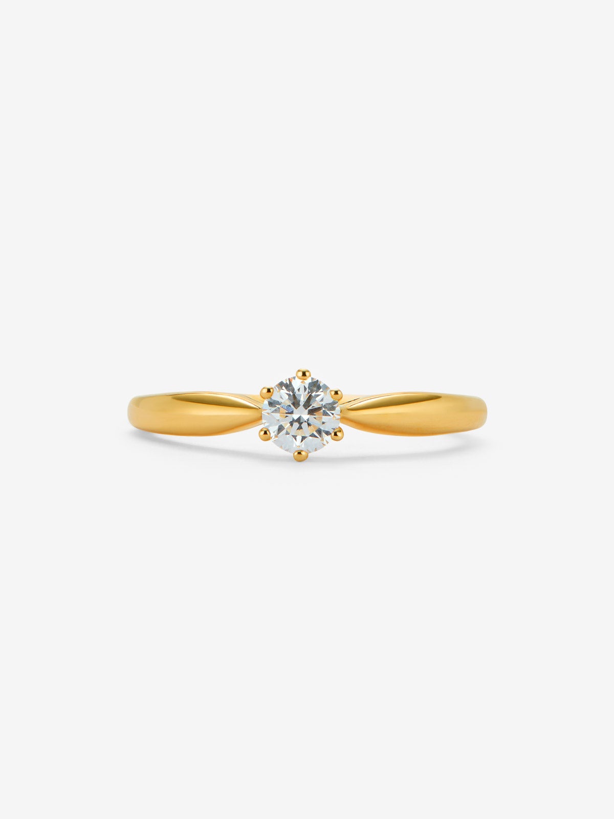 Anillo solitario de oro amarillo de 18K con diamante en talla brillante de 0,25 cts