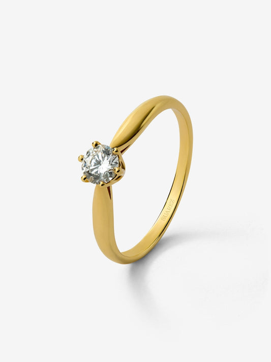 Anillo solitario de oro amarillo de 18K con diamante en talla brillante de 0,3 cts