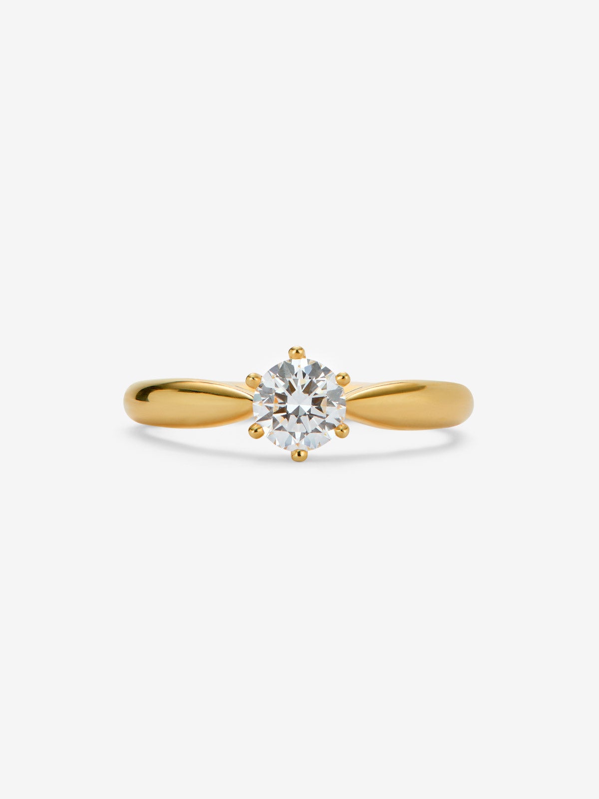 Anillo solitario de oro amarillo de 18K con diamante en talla brillante de 0,4 cts