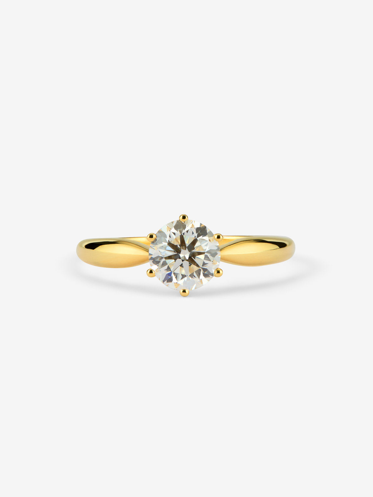 Anillo solitario de oro amarillo de 18K con diamante en talla brillante de 1 cts