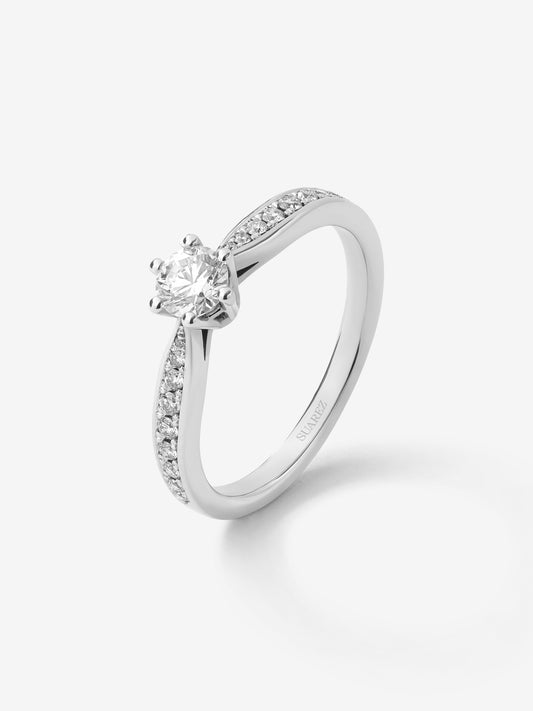 Solitaire ring in 18K white gold with a central 0.30-carat brilliant-cut diamond and additional diamonds totaling 0.16 cts
