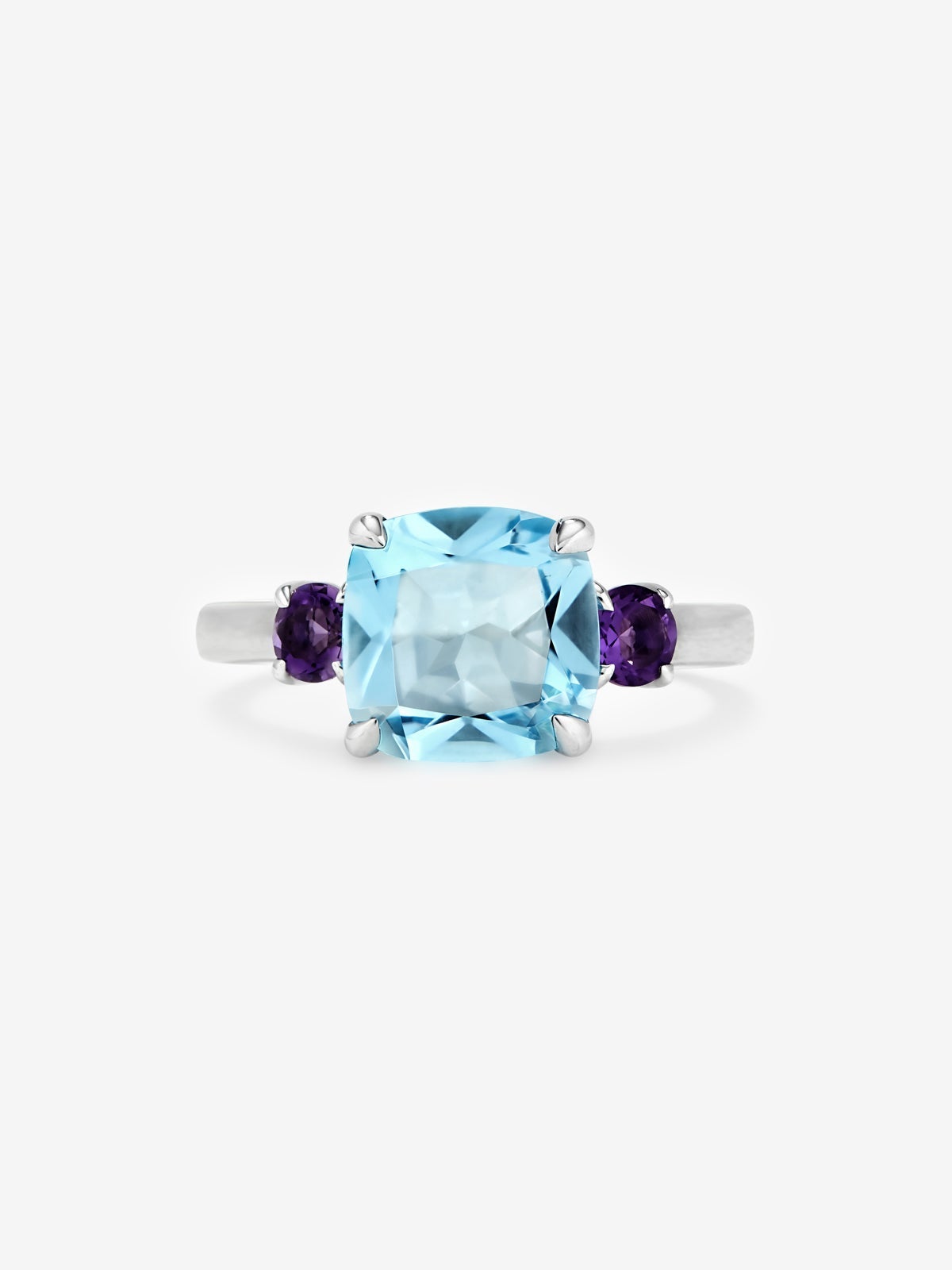 Anillo tresillo de plata 925 con topacio azul sky en talla cushion y amatistas moradas en talla brillante