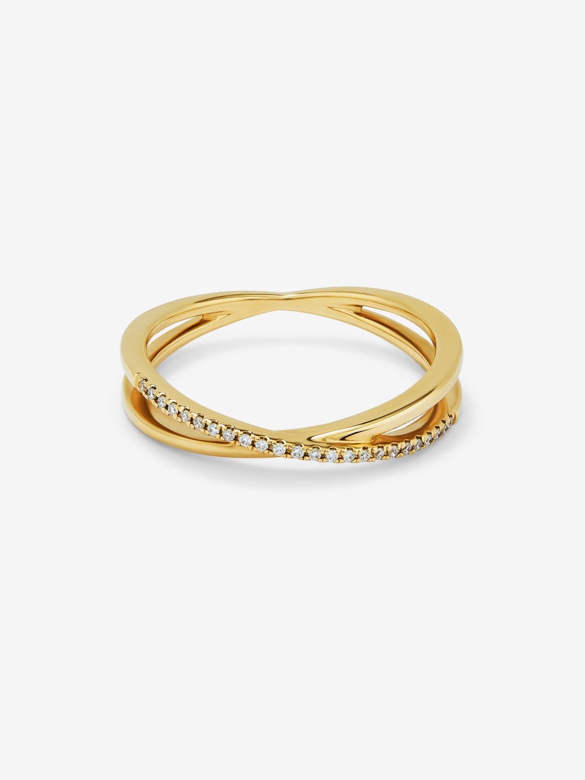 Anillo cruzado de oro amarillo de 18K con pave de diamantes