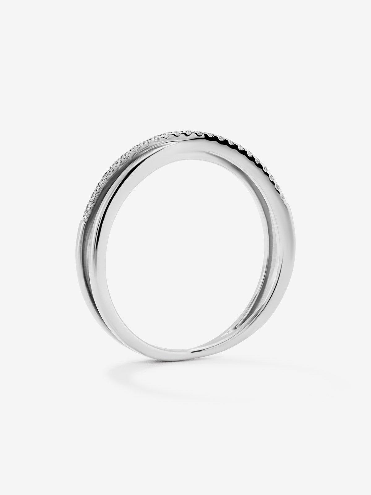 Anillo cruzado de oro blanco de 18K con 24 diamantes en talla brillante con un total de 0,07 cts