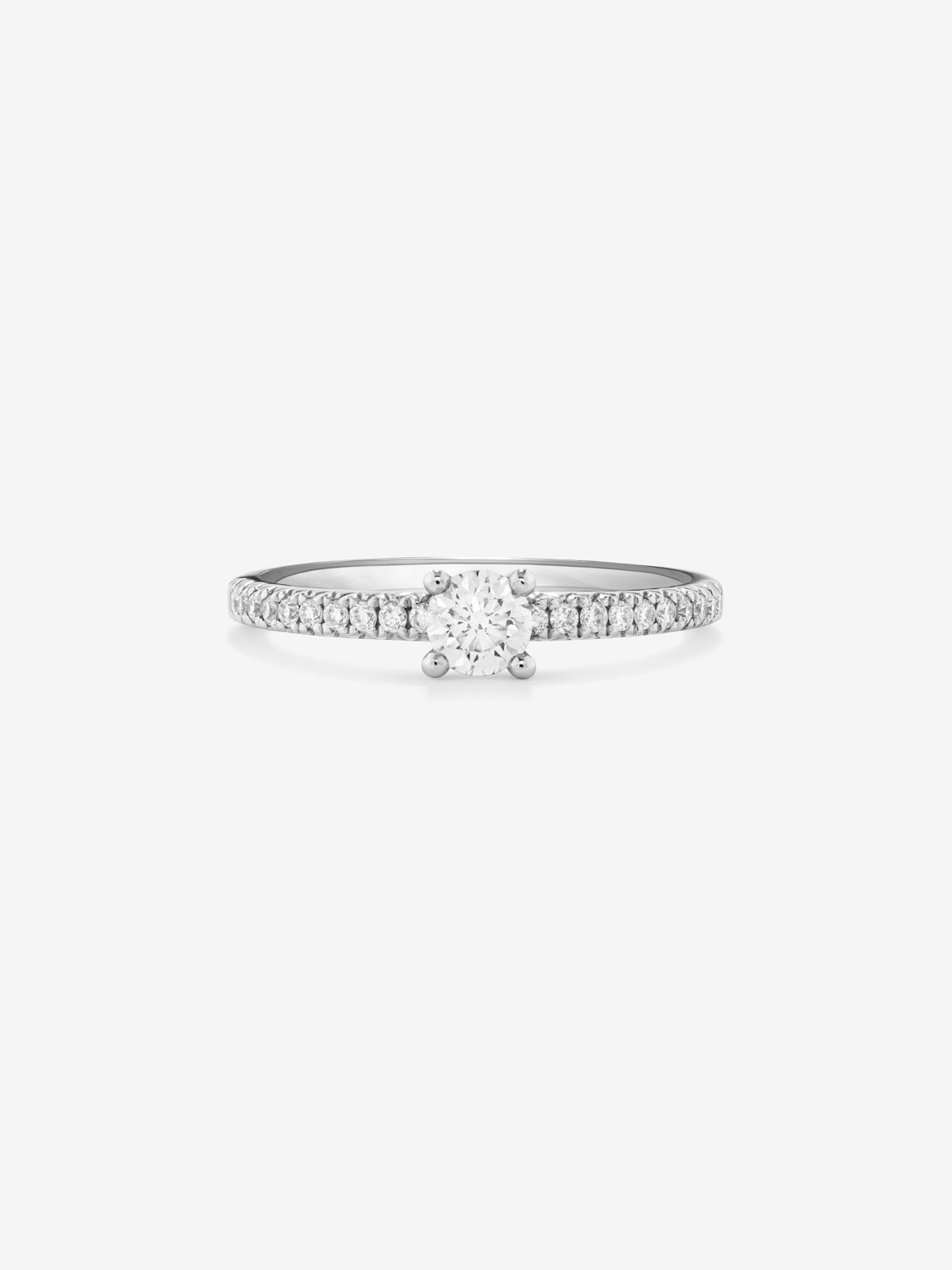 Anillo de oro blanco de 18K con diamante central en talla brillante de 0,12 cts y brazo de 20 diamantes en talla brillante con un total de 0,11 cts