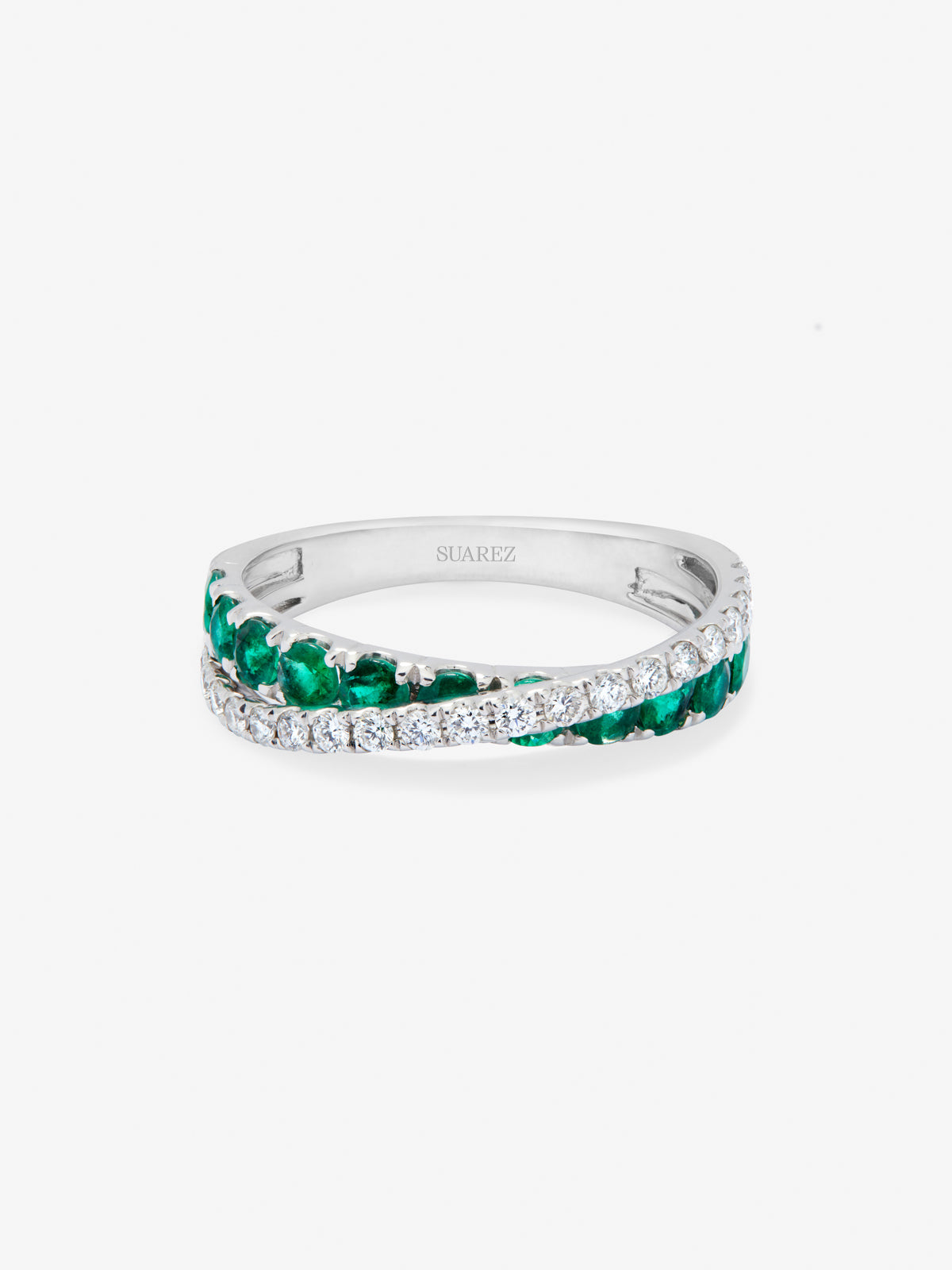 18K white gold crossover ring with 12 brilliant-cut emeralds totaling 0.71 cts and 20 brilliant-cut diamonds totaling 0.28 cts