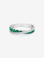 18K white gold crossover ring with 12 brilliant-cut emeralds totaling 0.71 cts and 20 brilliant-cut diamonds totaling 0.28 cts