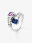 Anillo tú y yo de oro blanco de 18K con zafiro rosa en talla octogonal de 1,02 cts, zafiro azul royal en talla octogonal de 1,19 cts y 10 diamantes en talla baguette con un total de 0,57 cts