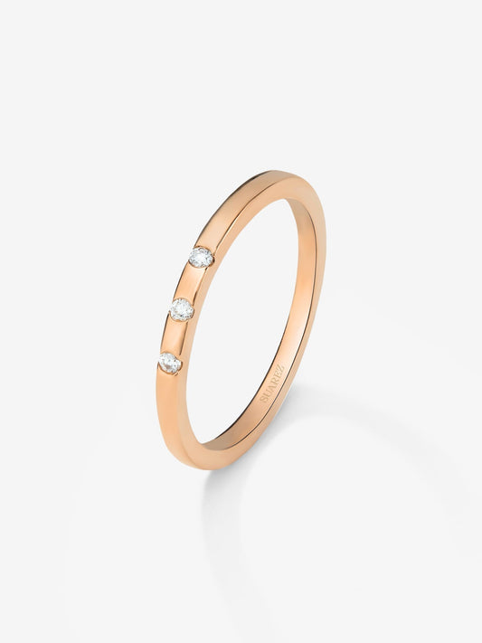 Anillo de oro rosa de 18K con 3 diamantes en talla brillante con un total de 1,4 cts
