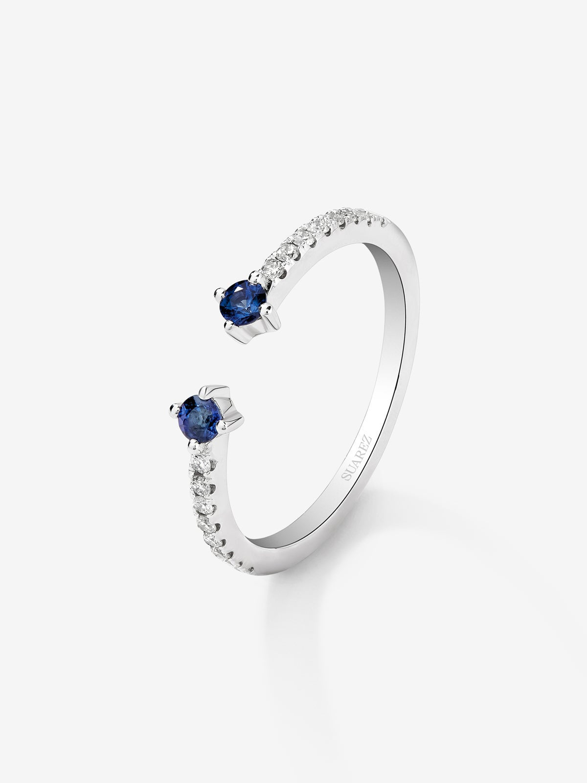 Anillo abierto de oro blanco de 18K con zafiro y diamante