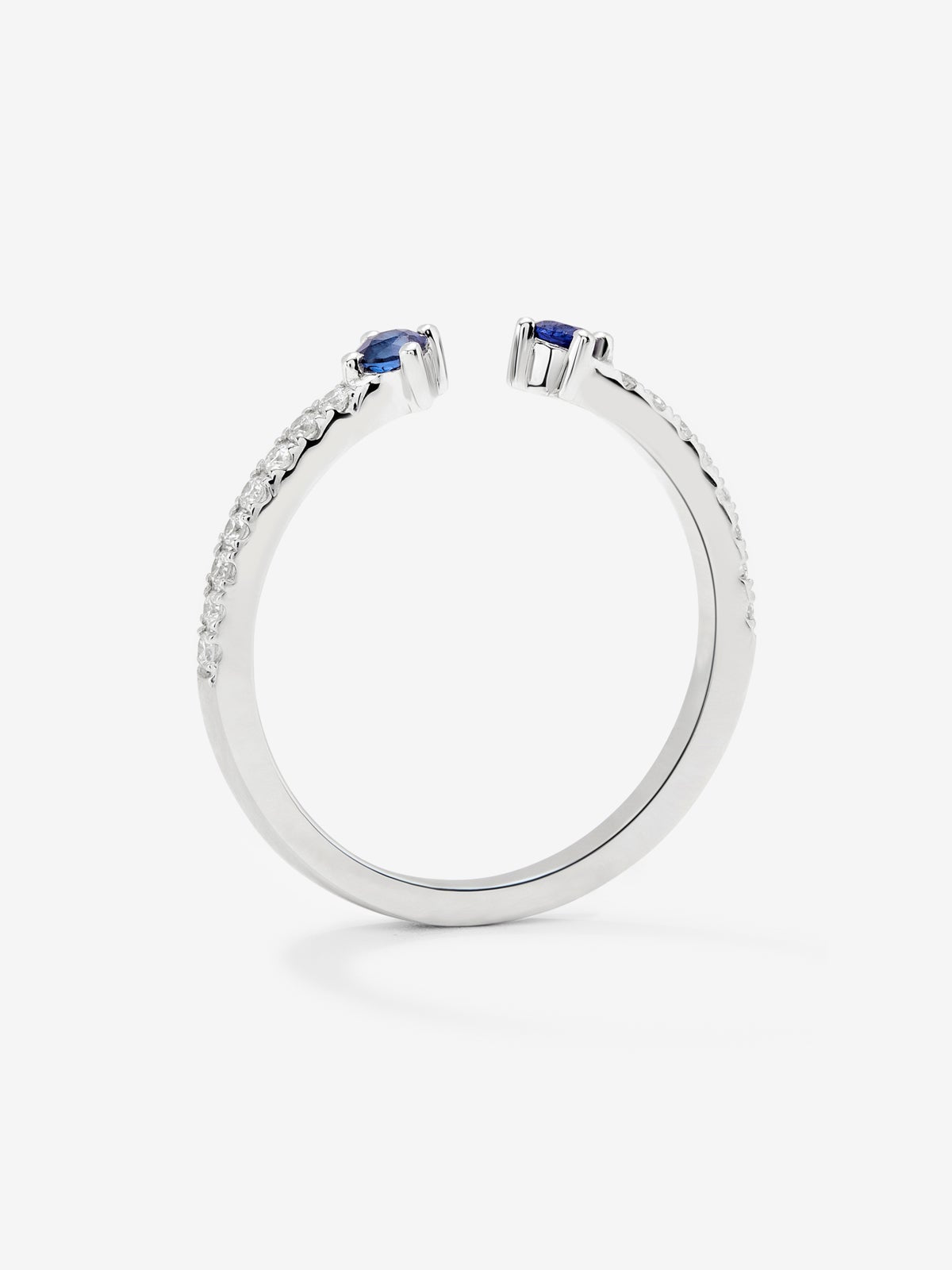 Anillo abierto de oro blanco de 18K con zafiro y diamante