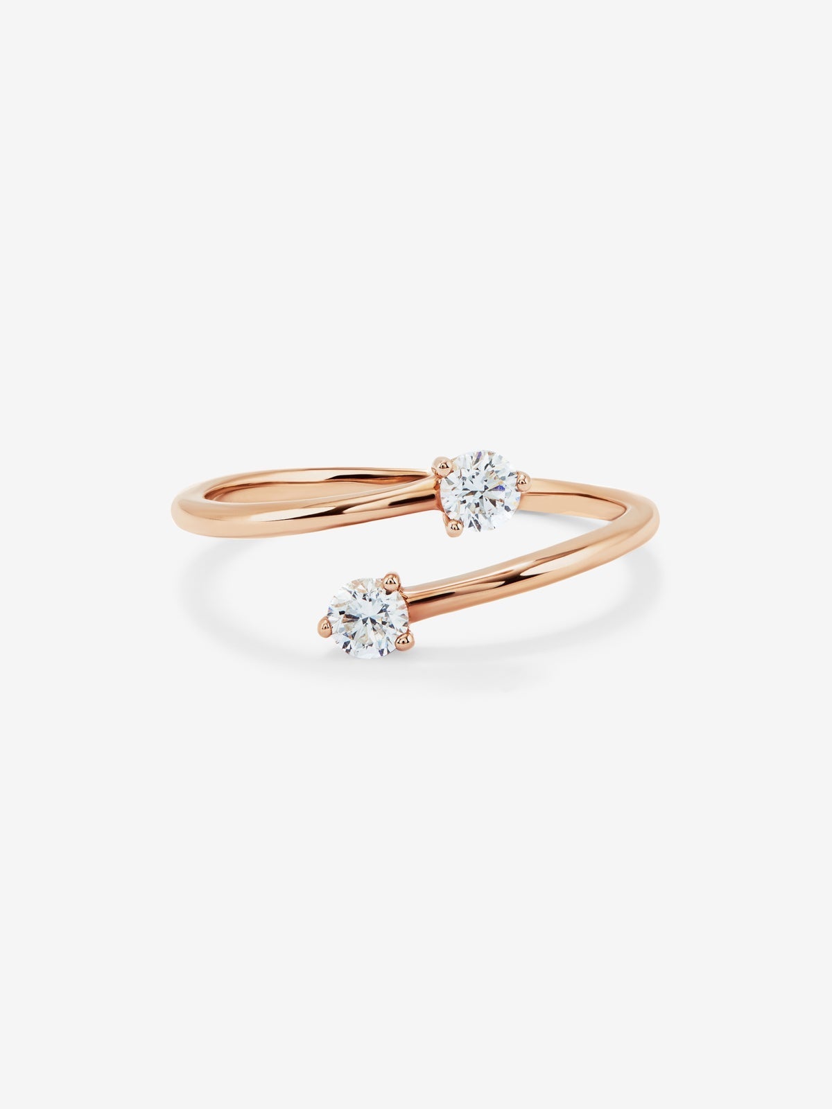 Anillo tú y yo de oro rosa de 18K con 2 diamantes en talla brillante con un total de 0,26 cts