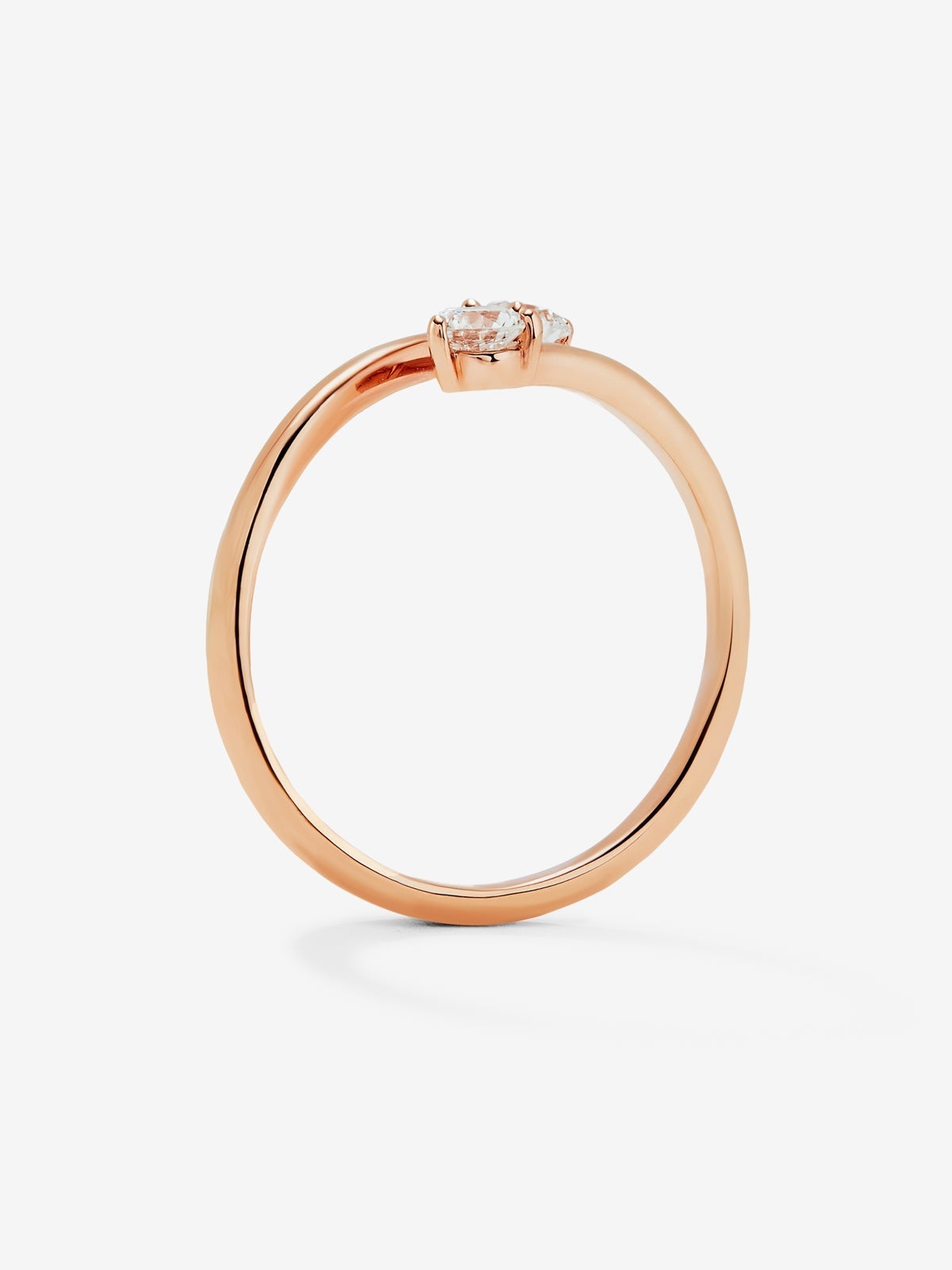 Anillo tú y yo de oro rosa de 18K con 2 diamantes en talla brillante con un total de 0,26 cts