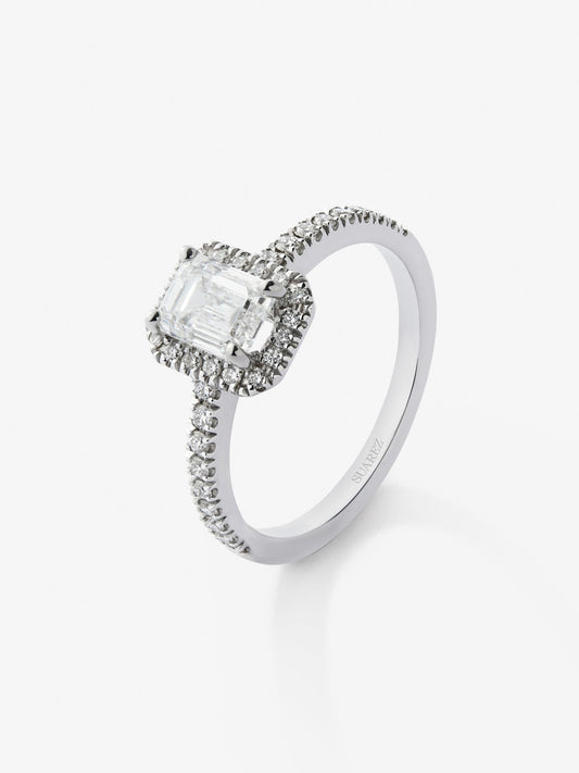 Anillo de oro blanco de 18K con diamante central 