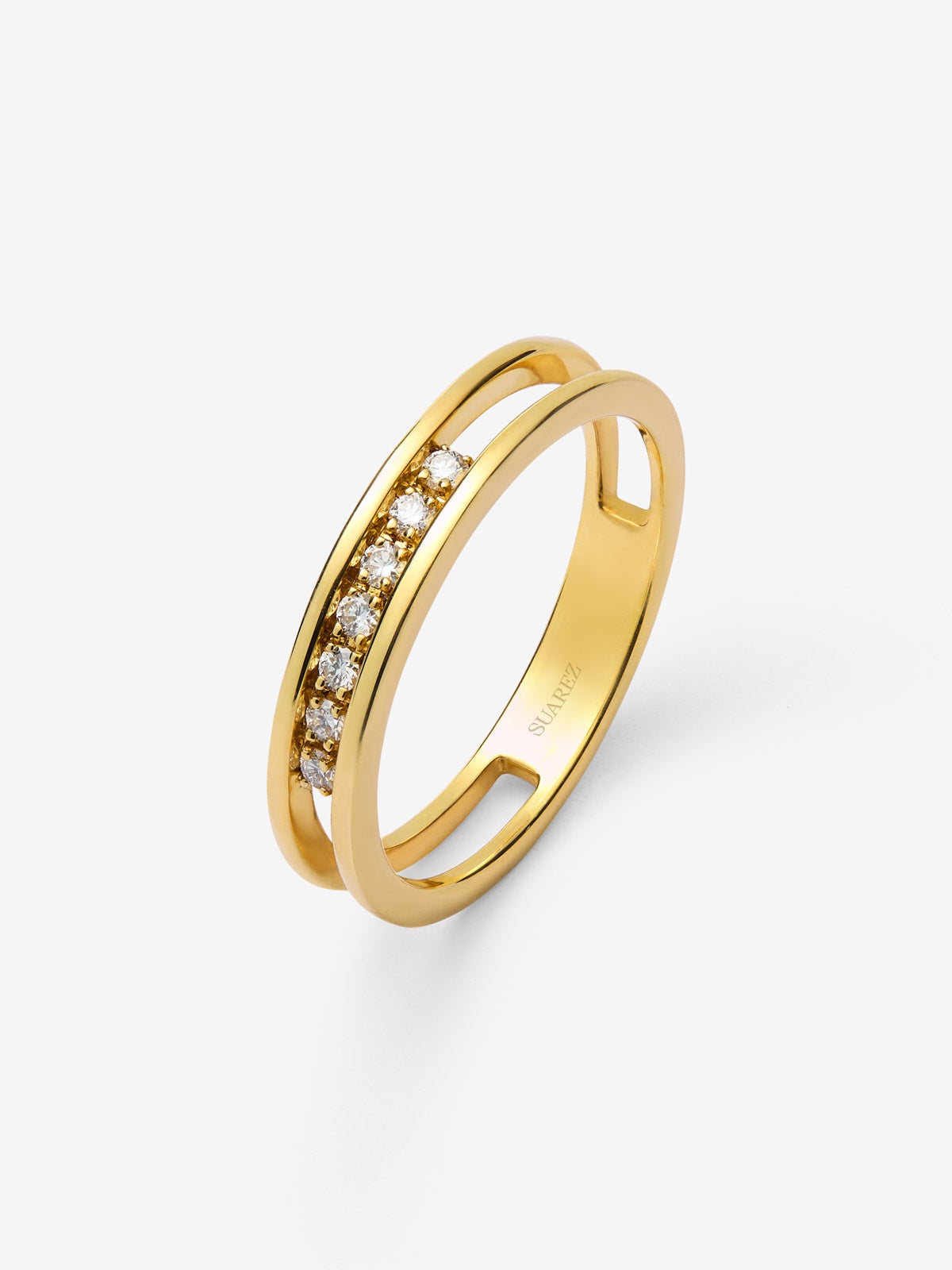 Anillo de oro amarillo de 18K con 7 diamantes en talla brillante con un total de 0,10 cts