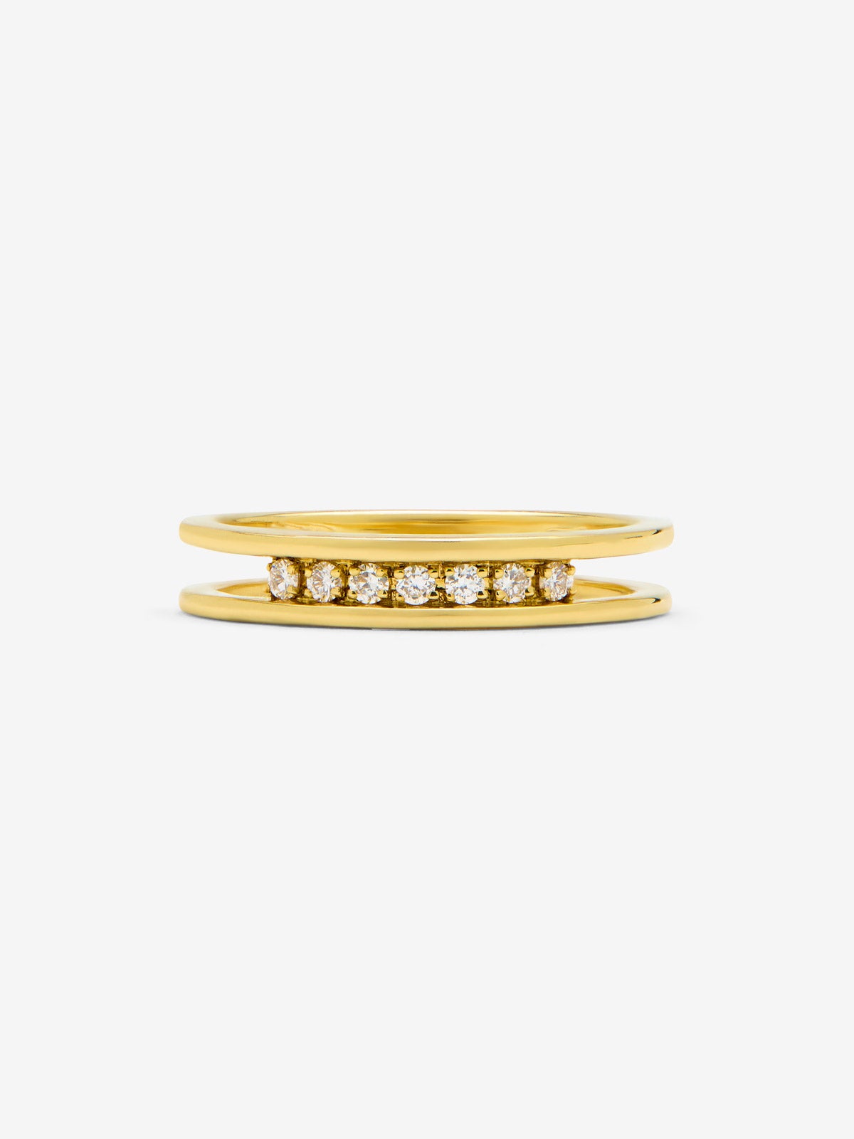Anillo de oro amarillo de 18K con 7 diamantes en talla brillante con un total de 0,10 cts