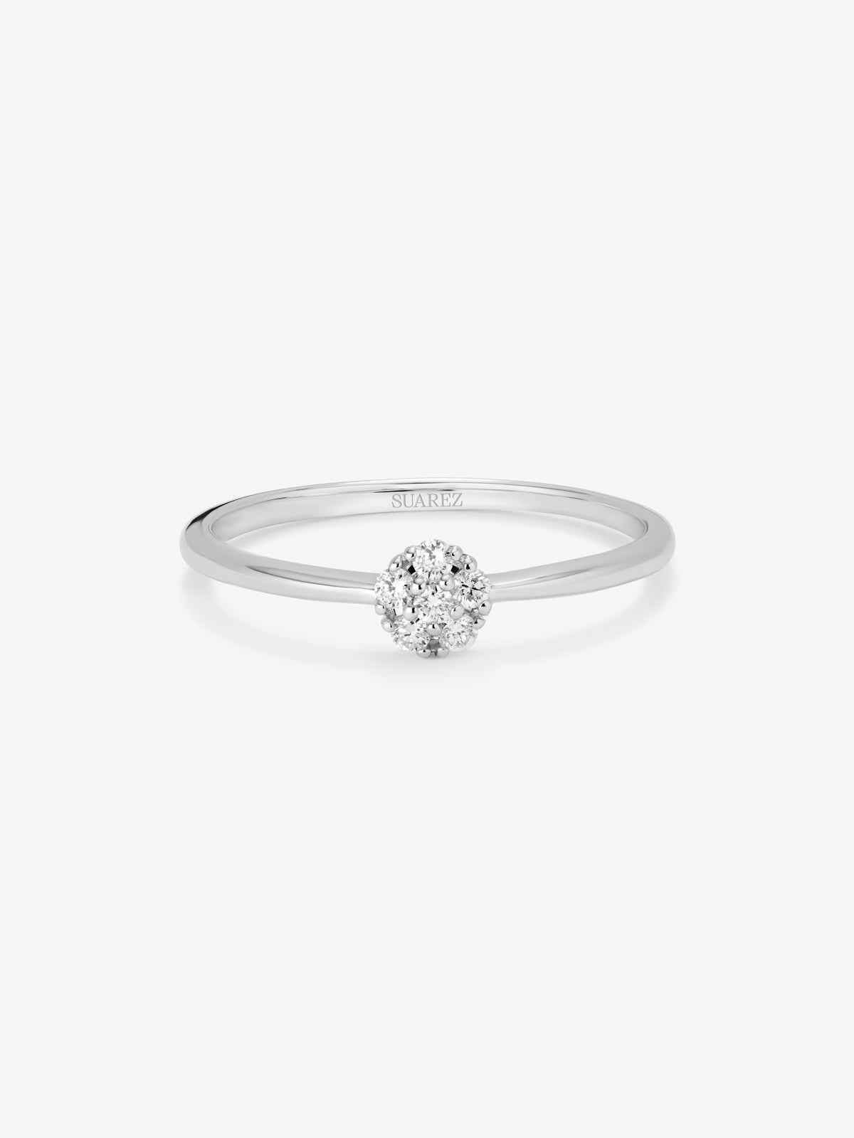 Anillo de oro blanco de 18K con roseta de 15 diamantes en talla brillante con un total de 0,09 cts