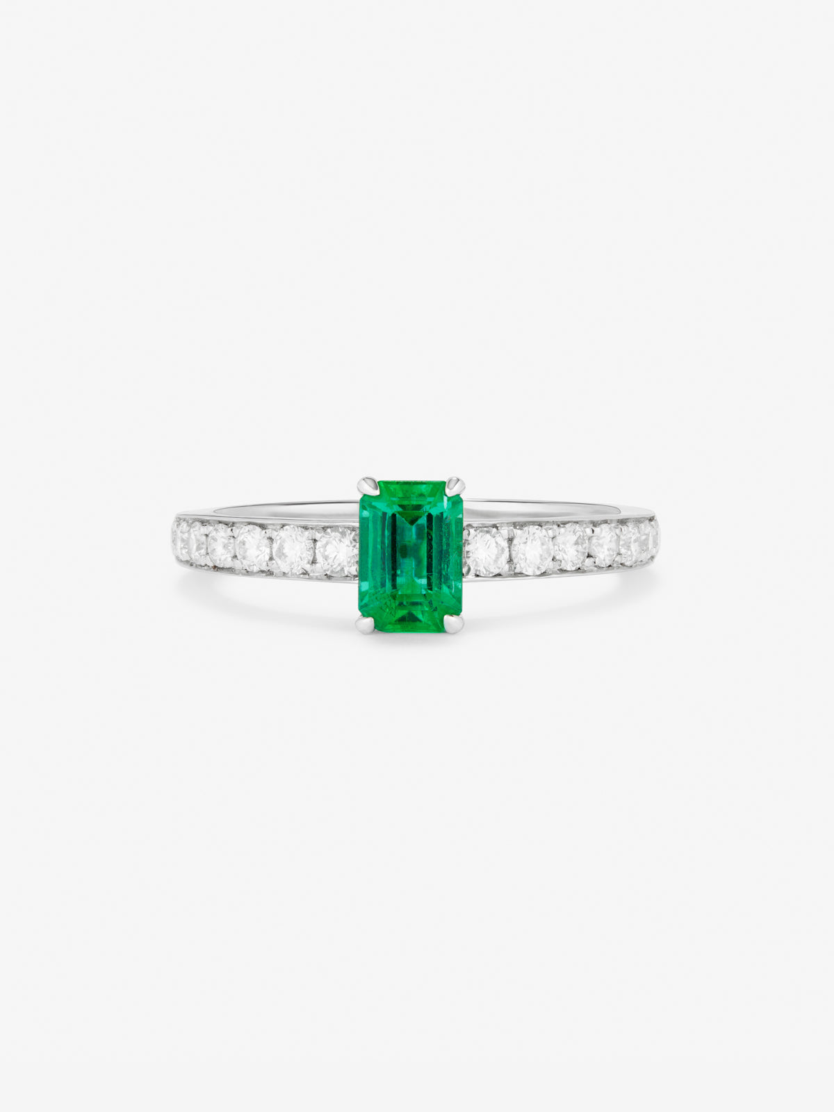 Sortija con esmeralda octogonal de 6x5  de 0.9 ct acompañada de un total de 0,27 ct de diamante