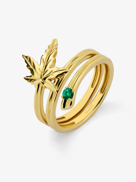 Anillo de oro amarillo de 18K con esmeralda en talla brillante de 0,07 cts y forma de hoja de arce