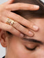 Anillo de oro amarillo de 18K con diamante en talla brillante de 0,10 cts y forma de hoja de arce