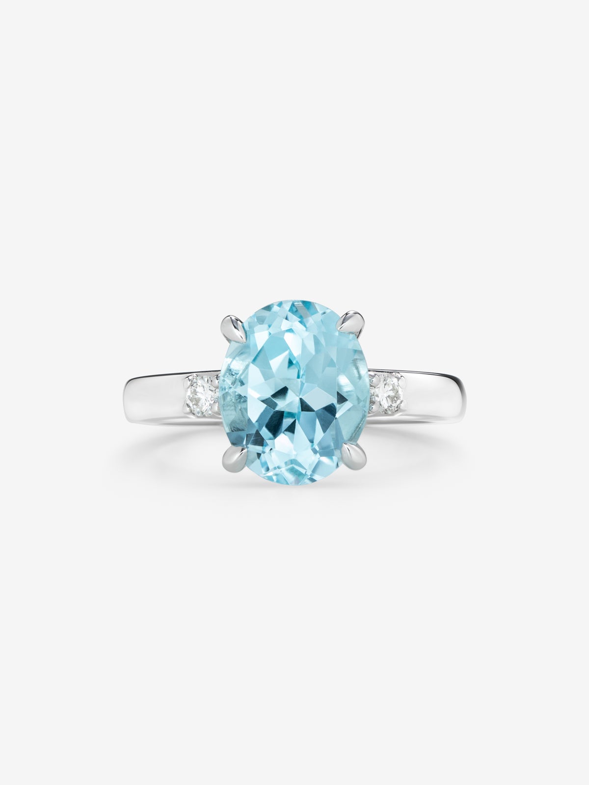 Anillo tresillo de plata 925 con topacio azul Sky y diamantes