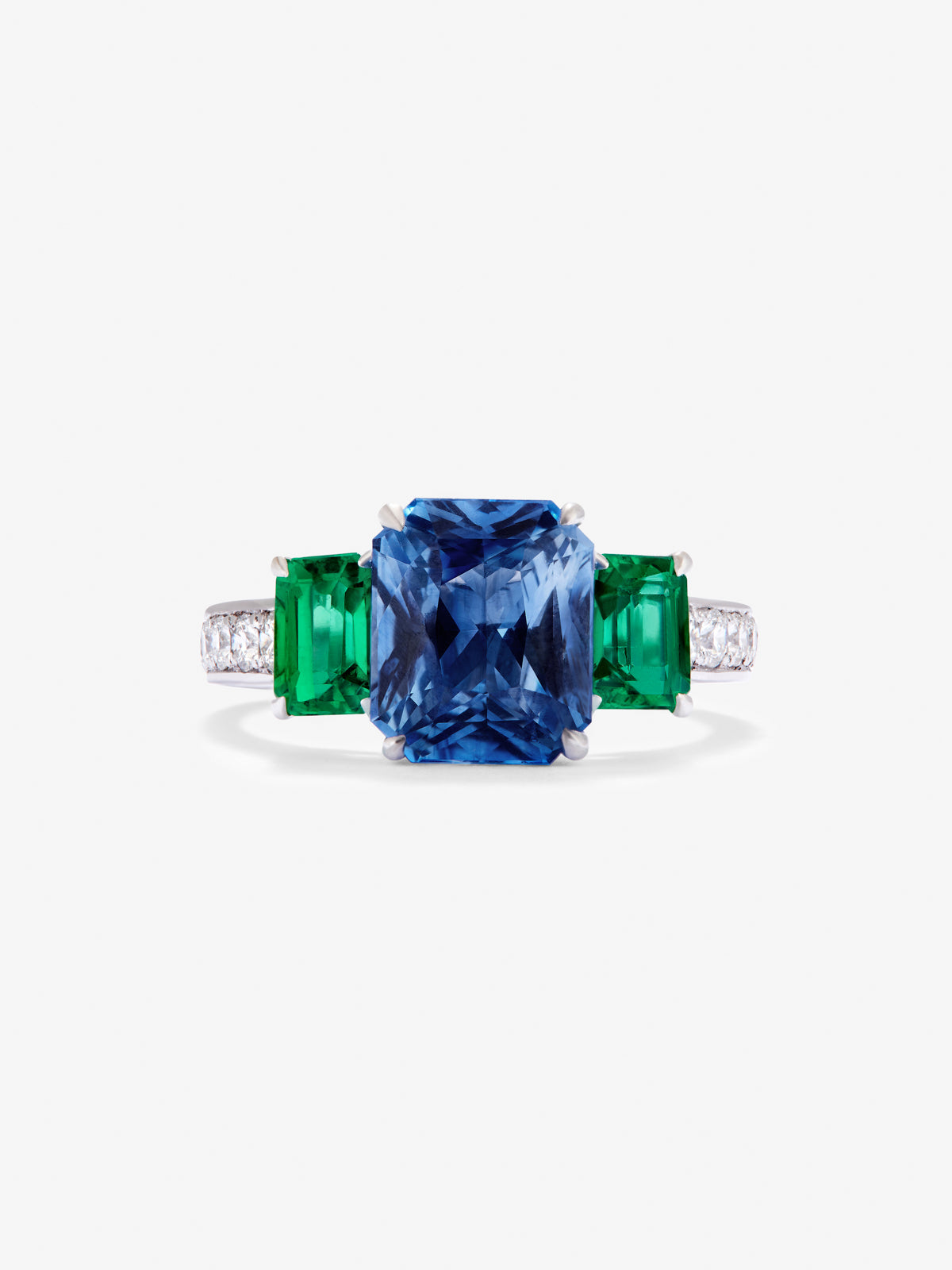 18K White Golden Tieillo Ring with blue sapphire in 3.6 cts, green emeralds in octagonal size 1.12 cts and white diamonds in bright size of 0.073 cts