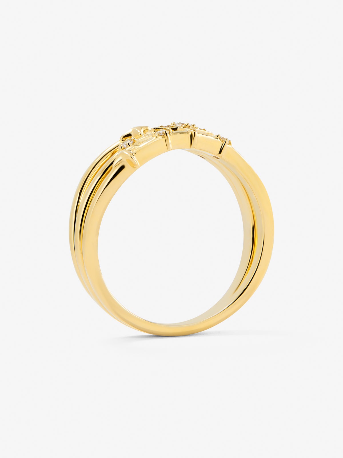 Anillo multibrazo de oro amarillo de 18K con 9 diamantes en talla brillante con un total de 0,08 cts